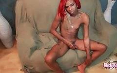 Naughty skinny ebony she-male is posing for your pleasure.